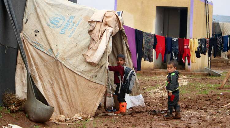Two boys in a refugee camp in Idlib.