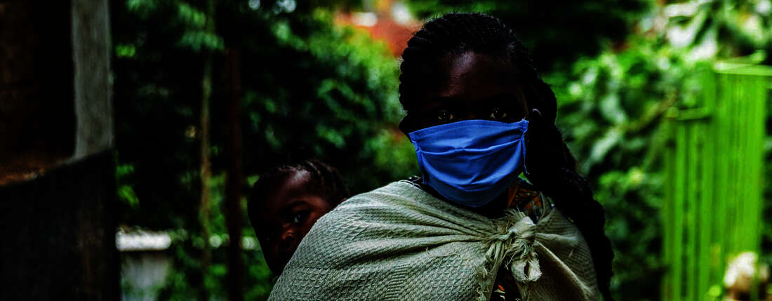 A woman with a face mask