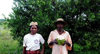Two farmers: a woman and a man