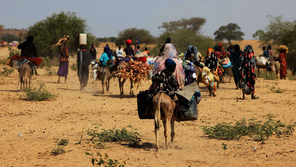 Sudanese refugees who have fled the violence in the Darfur region seek temporary refuge in Goungour, Chad