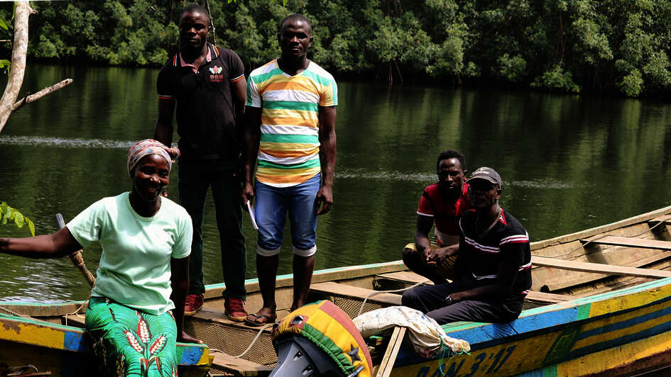 The Gbawleh family with their new boat